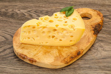 Maasdam cheese - yellow triangle with holes