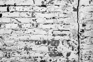 Texture of a concrete wall with cracks and scratches which can be used as a background