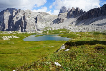 View of a lake on the hike between Val Fiscalina and Three Peaks of Lavaredo on a summer day, sudtirol, Belluno, Trentino Alto Adige, Dolomites, Unesco, Italy