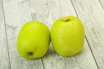 Two ripe green sweet apples