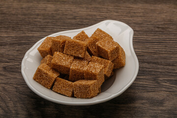 Cane sugar cubs in the bowl