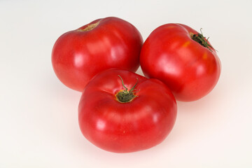 Red ripe tomato isolated on white