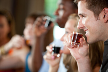 Bar: Friends All Together Drinking Shots