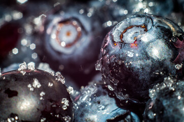 Macro of blueberries poured with sugar