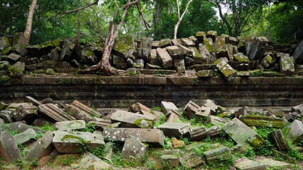 Fototapeta na wymiar Cambodia Siem Reap－July 27, 2016: Ancient architecture and natural scenery in Angkor Wat Cambodia. Photo taken in outside area. (Lady temple, Water fall (Phnom Kulen), Beng Mealea temple and Tonle Sa