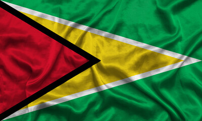 Guyana national flag background with fabric texture. Flag of Co‑operative Republic of Guyana waving in the wind. 3D illustration