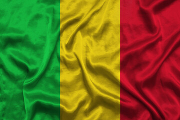 Mali national flag background with fabric texture. Flag of Mali waving in the wind. 3D illustration.