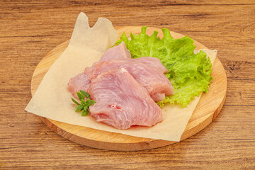 Raw turkey breast steak for cooking