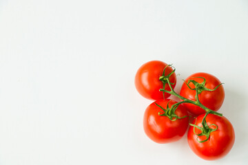 Red four tomatoes on the white background