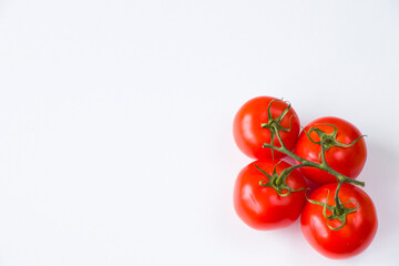Red four tomatoes on the white background