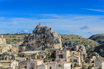 The sanctuary of Santa Maria de Idris is dug into the rock overlooking the Sasso Caveoso, on which stands a large wrought iron cross. It shows a lancet on the façade and a bell tower. Matera,Italy