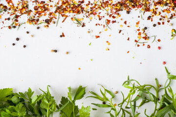 Greens vegetable leaves and spices on the white background