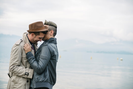 Romatic gay couple at the lake