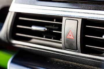 Press the emergency light button,  pressing red triangle car hazard warning button.