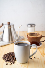 dripping coffee on wooden kitchen table