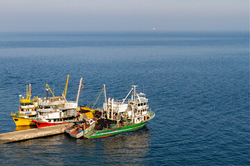 Colorful fishing boats on the Sea of Marmara, in Trilye, Mudanya, Turkey