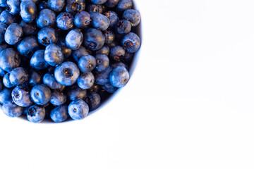 Blueberries isolated on a white background. Healthy lifestyle of vitamin fruits.