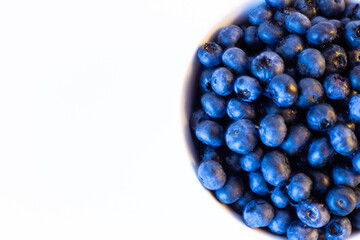 Blueberries isolated on a white background. Healthy lifestyle of vitamin fruits.