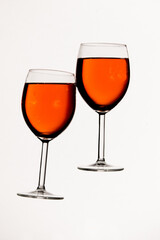 Red wine in glasses on a white background isolated