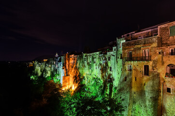 Night view of Sant'Agata de' Goti. The picturesque medieval town is perched on a sheer bluff high above a river gorge. 