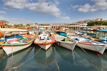 Fototapeta na wymiar Fishing boats in the harbor of Kusadasi, Turkey.