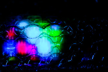 abstract background created with a colorful image through a sheet of plastic bubble wrap