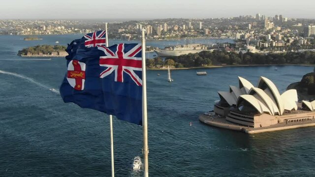Australian Flags on Sidney Harbor Bridge, Australia. Aerial orbit