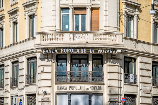 Rome, Italy - September 4, 2018: Historic old building with sign for Banca Popolare di Novara on corner with nobody exterior facade of bank business