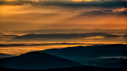 Sunrise over the mountain forest. Bieszczady National Park. Carpathian Mountains. Poland.