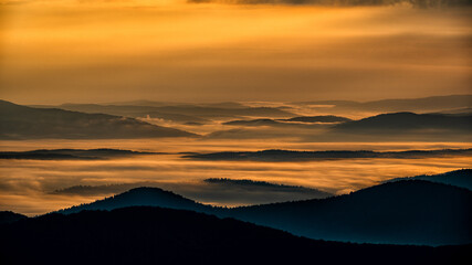 Sunrise over the mountain forest. Bieszczady National Park. Carpathian Mountains. Poland.