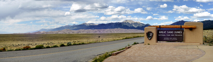 Entrance to Great Sand Dunes National Park in Colorado with panorama of the dunes in the background