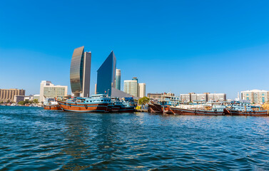 Dhow boats moored on the higher reaches of the Dubai Creek in the UAE in springtime