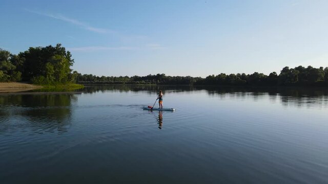 Water rides on sup boarde .