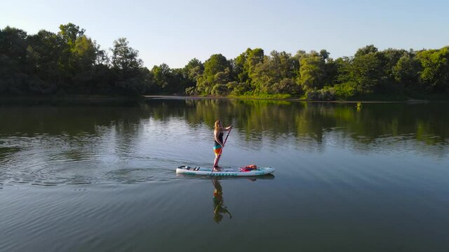 Water rides on sup boarde .
