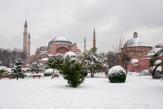Hagia Sophia mosque and  Hurrem Sultan Bathhouse  at snowy winter in Sultanahmet square, Istanbul City, Turkey