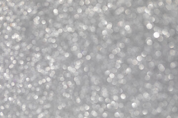 Silver abstract background with bokeh defocused lights