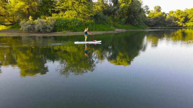 Water rides on sup boarde .