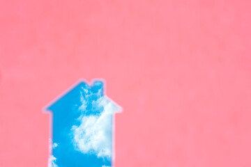 Close up silhouette of a house in the sky background.