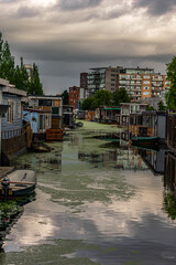 houseboats along a canal in Groningen Netherlands