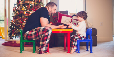Boy playing with his father dada 