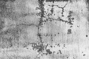 Texture of old gray painted building wall with cracks and smudges close up