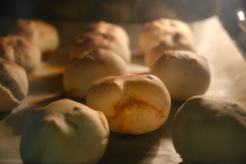 Chorizo buns browning in the oven