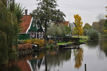 Fototapeta na wymiar autumn landscape with houses and trees