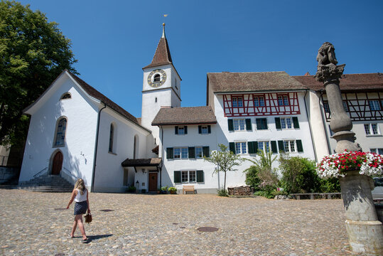Regensberg, Switzerland, with a church and medieval buildings.