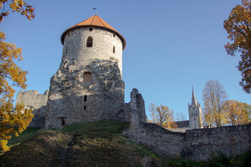 Autumn Park With Old Castle Ruins in Cesis, Latvia. 13th Century Ancient Livonian Castle