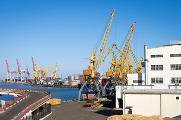 Fototapeta na wymiar industrial photo of cargo port and cranes 
