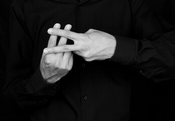 mannequin and black and white photography demonstrating sign language using hands