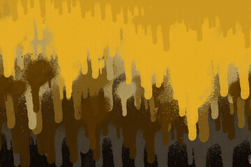 Gold spray paint ink texture. Graffiti painting on the wall. Street art and vandalism. Digitally airbrushed paper background.