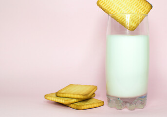 Milk Glass & Milk Cookies On pink Background