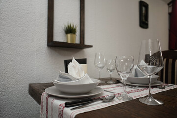 Empty table set for dinner